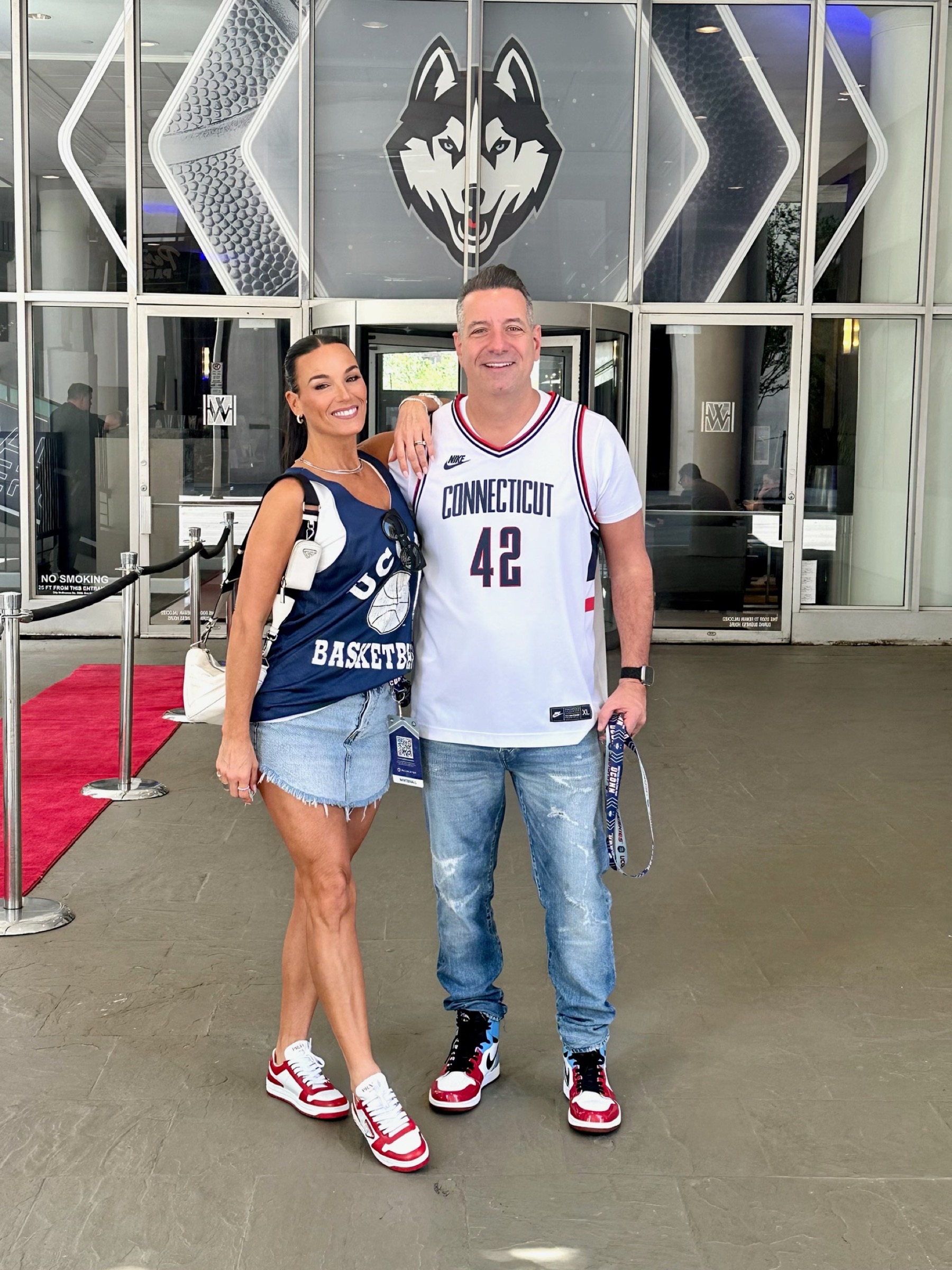 Marc D'Amelio and Heidi D'Amelio at a UConn Men's Basketball game