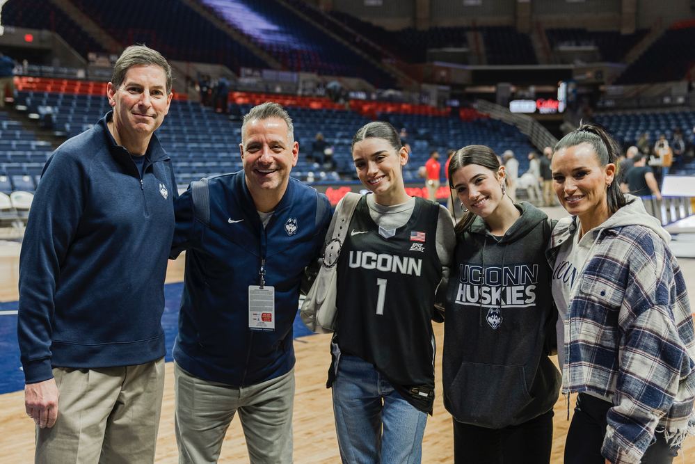 Marc D'Amelio and family with Ted Woodward at Gampel Pavilion